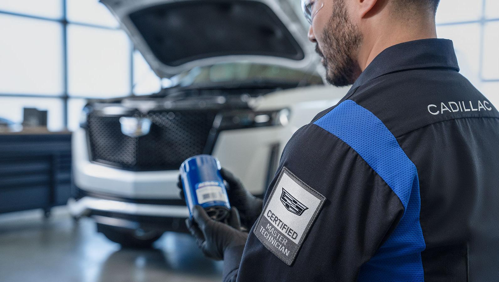 Cadillac-certified technician performing service at Huston Cadillac serving Lake Wales and Central Florida drivers