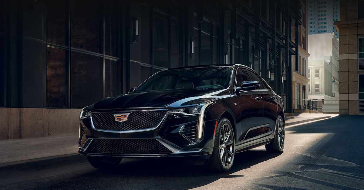 2025 Cadillac CT4 exterior driving down an urban street