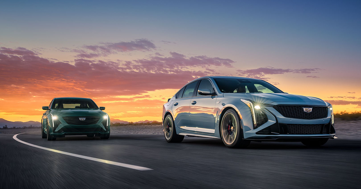 2025 Cadillac CT5 Sedans driving down a highway at sunset