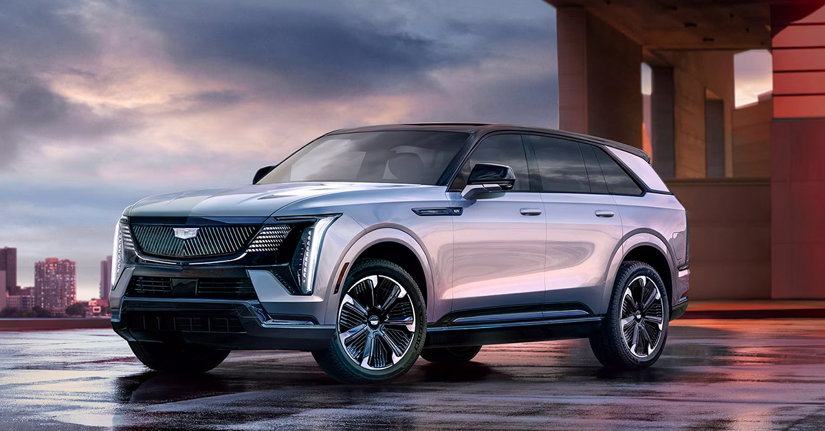 2025 Cadillac Escalade IQ exterior parked at sunset with clouds in the background