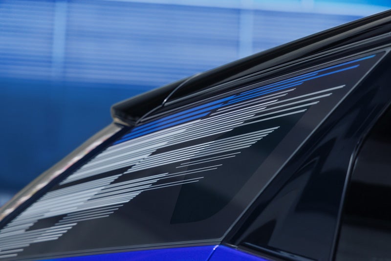 Close-up of the Modern Pattern on the 2026 OPTIQ-V Rear Quarter Glass | Huston Cadillac in LAKE WALES FL